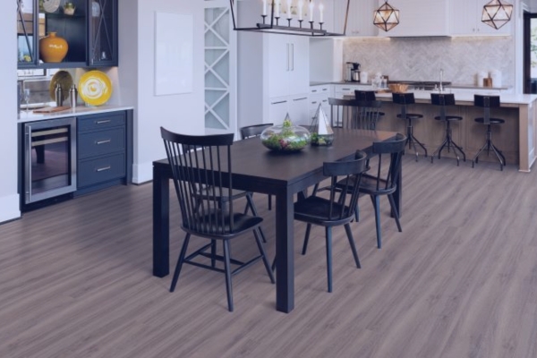 Sleek vinyl flooring being expertly installed in an Edmonton home